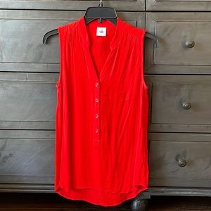 Summertime vibes with this vibrant red tank top